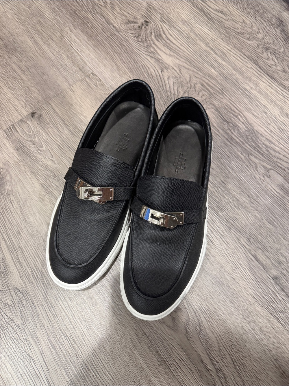 Hermes Black Leather Slip-On Loafers with Silver Buckle and White Sole